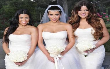 كيم كارداشيان تكشف سر ارتدائها 3 فساتين زفاف 